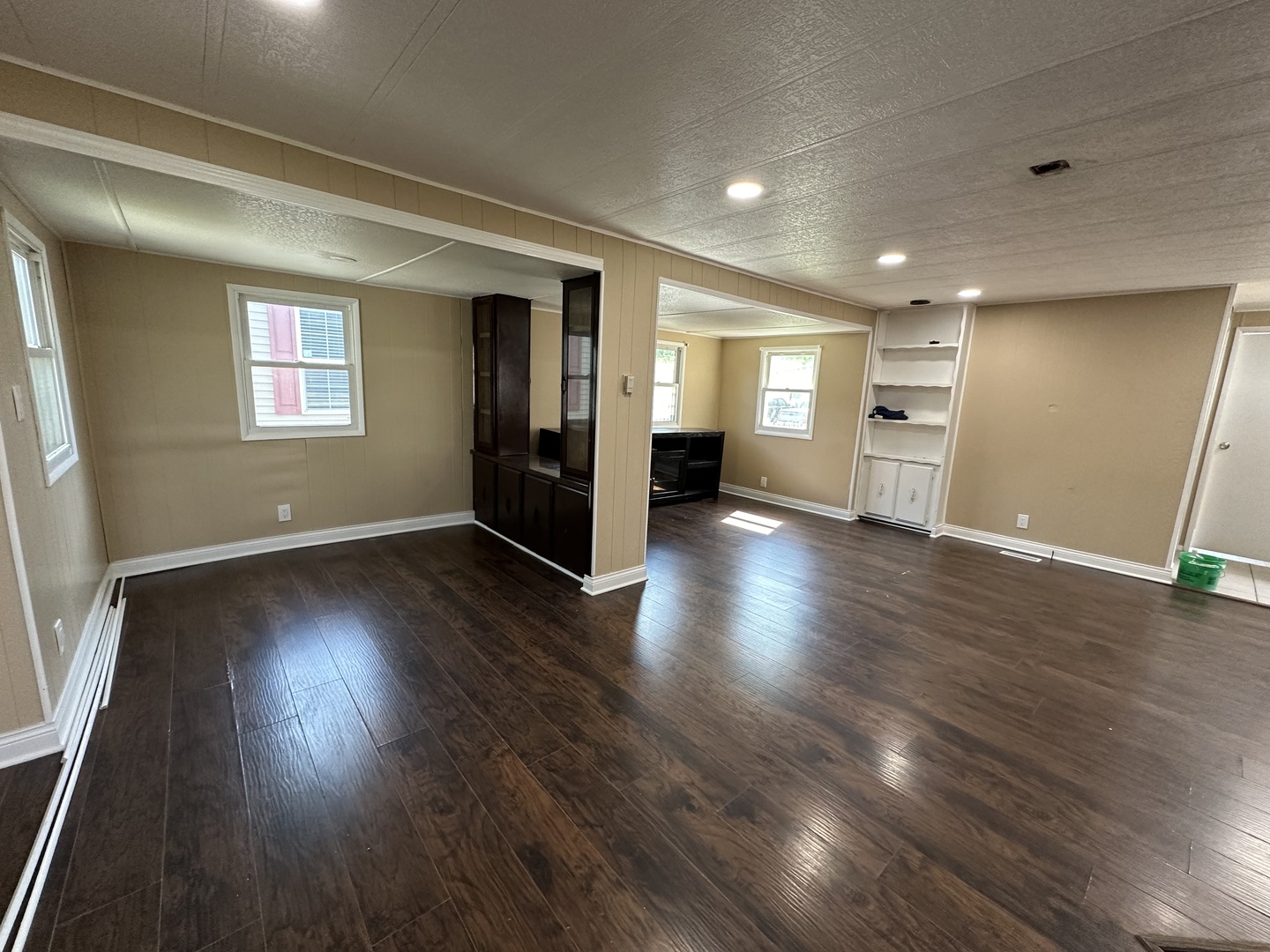 180 North Windmere Circle Matteson, IL 60443 - Photo 5 of 32 an empty room with wooden floor and windows
