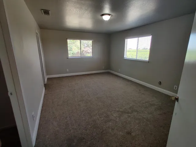 a bathroom with a toilet and a sink