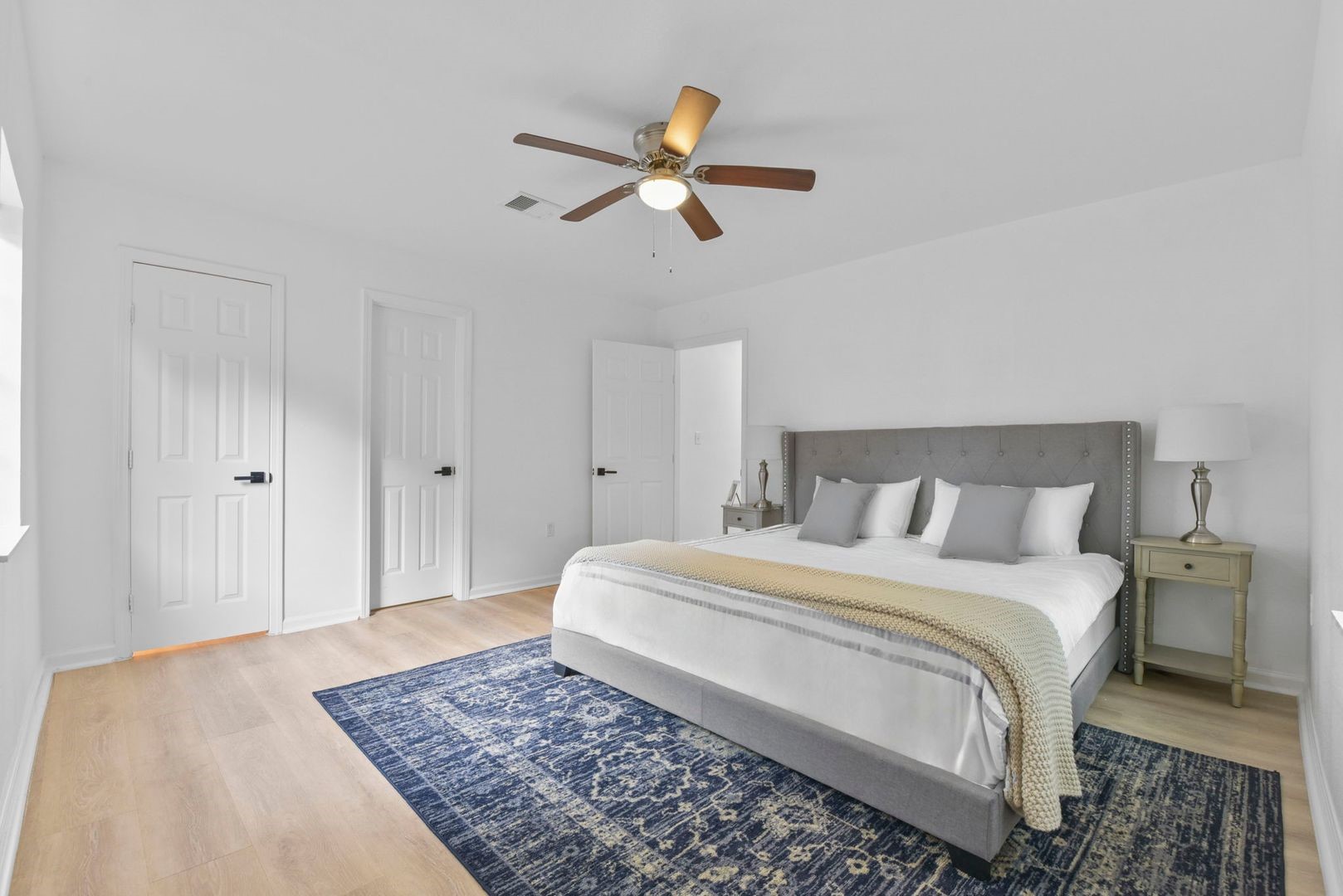 5530 Malmedy Road Houston, TX 77033 - Photo 13 of 23 a bedroom with a bed and a dresser