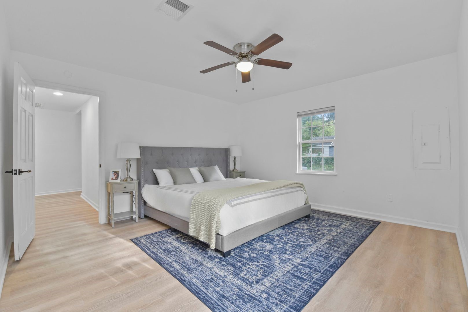 5530 Malmedy Road Houston, TX 77033 - Photo 14 of 23 a bedroom with a bed rug and window