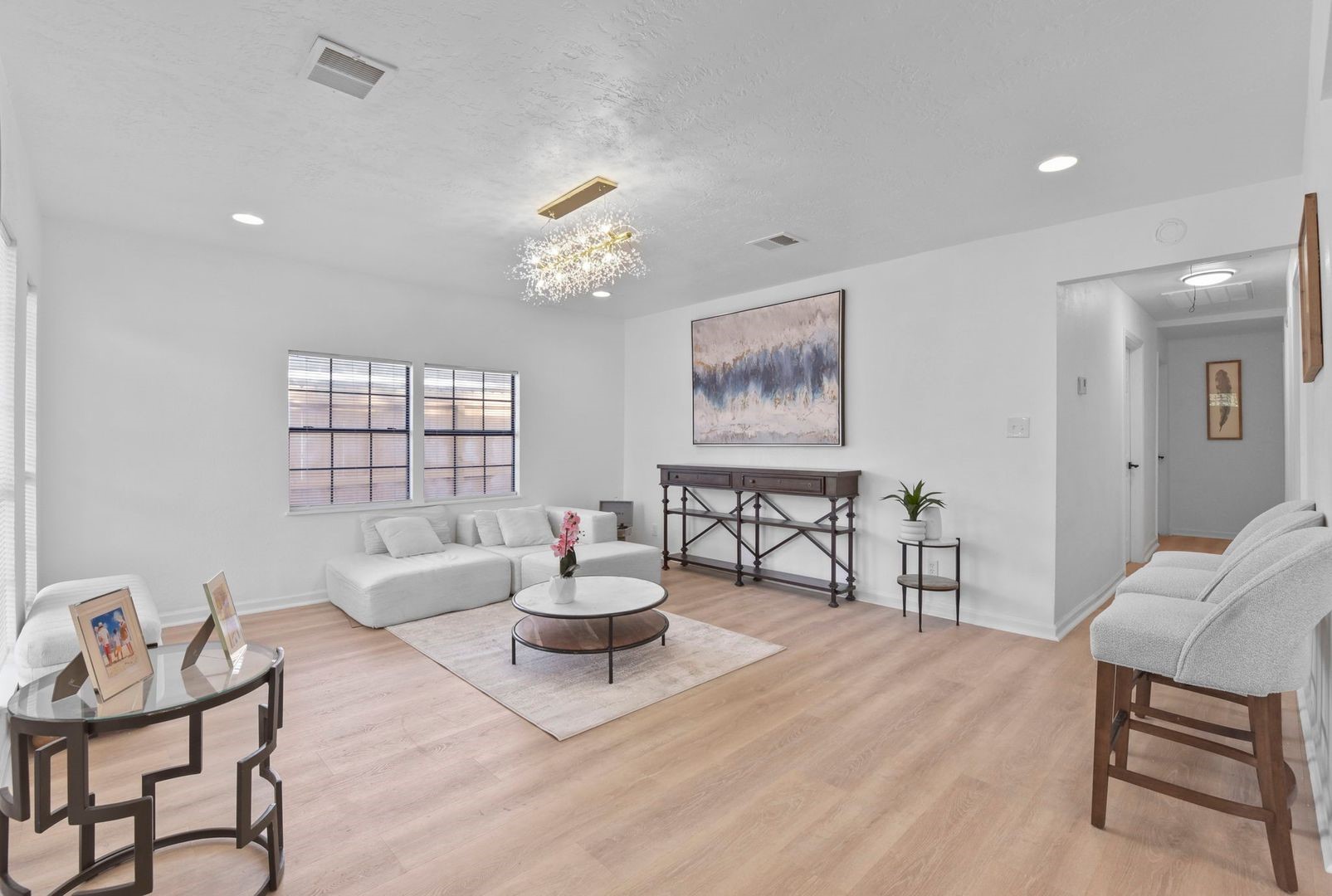 5530 Malmedy Road Houston, TX 77033 - Photo 17 of 23 a living room with furniture and a wooden floor