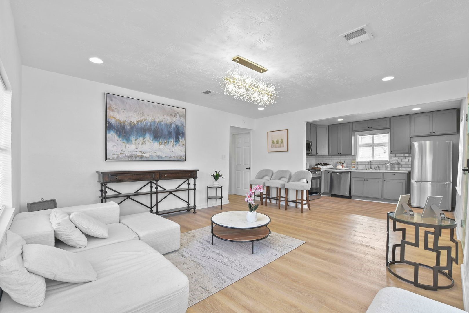 5530 Malmedy Road Houston, TX 77033 - Photo 19 of 23 a living room with furniture and wooden floor