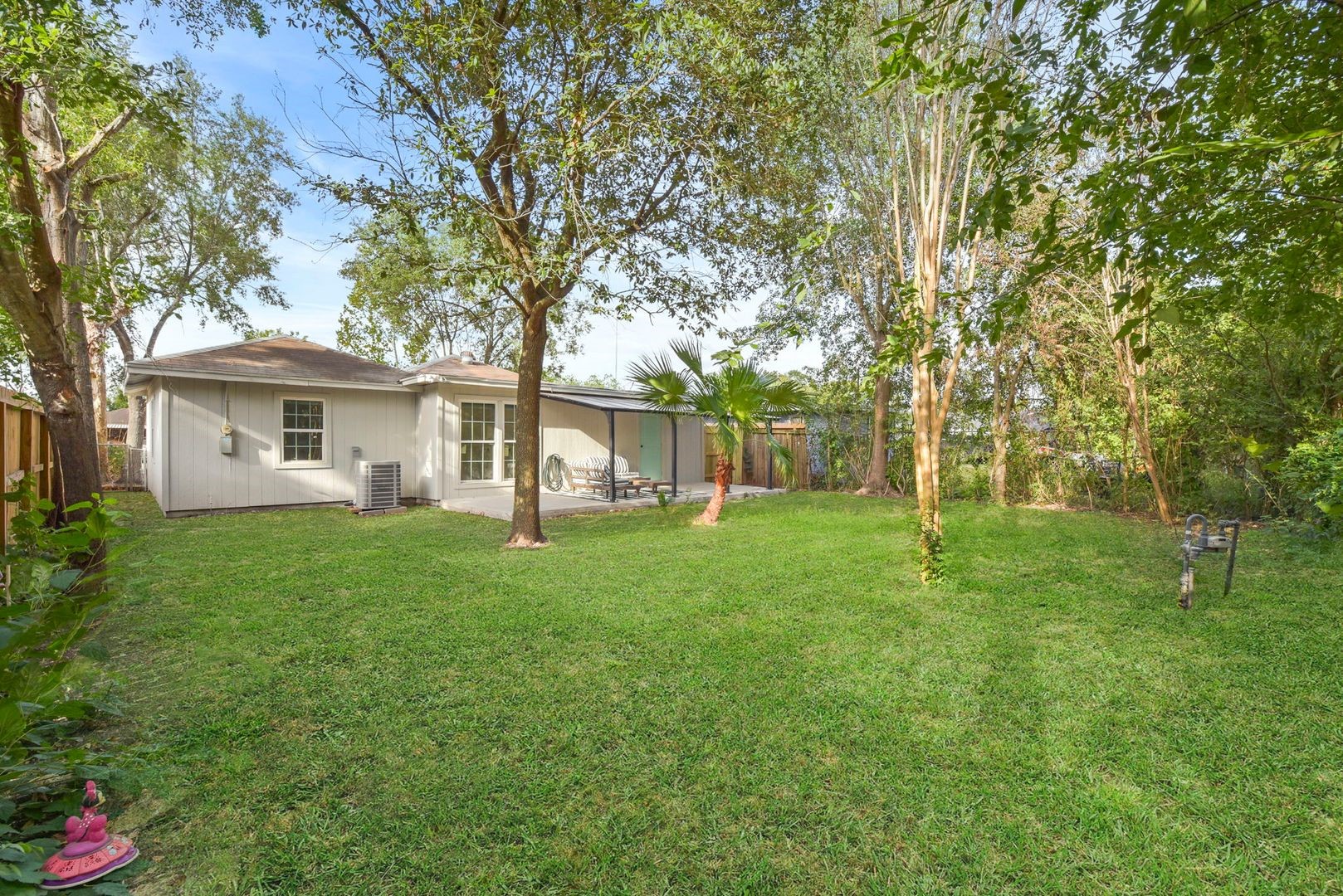 5530 Malmedy Road Houston, TX 77033 - Photo 21 of 23 a view of a house with a backyard