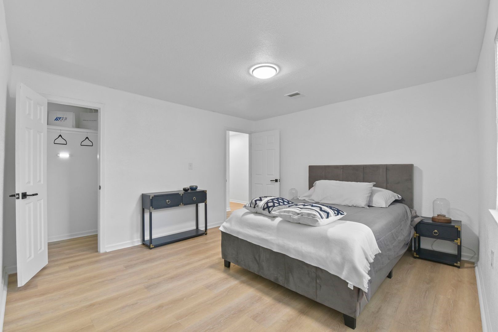 5530 Malmedy Road Houston, TX 77033 - Photo 10 of 23 a bedroom with a bed and a couch