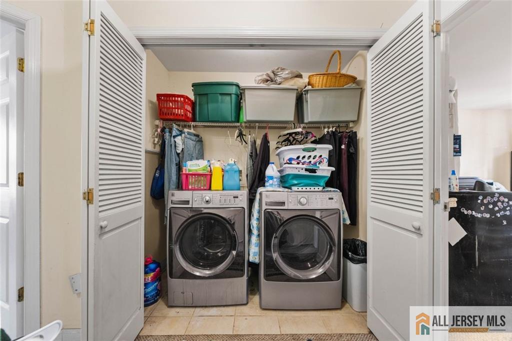 643 Drake Avenue Middlesex, NJ 08846 - Photo 24 of 28 a utility room with dryer and washer