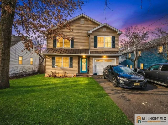 a house view with a garden space