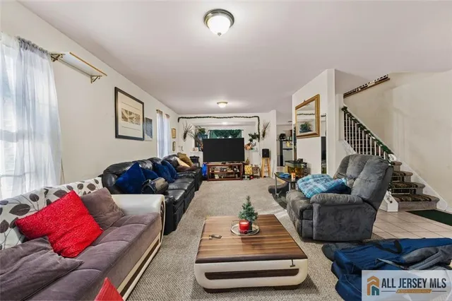 a living room with furniture and a couch