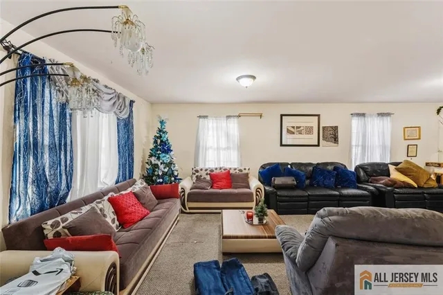 a living room with furniture and a couch