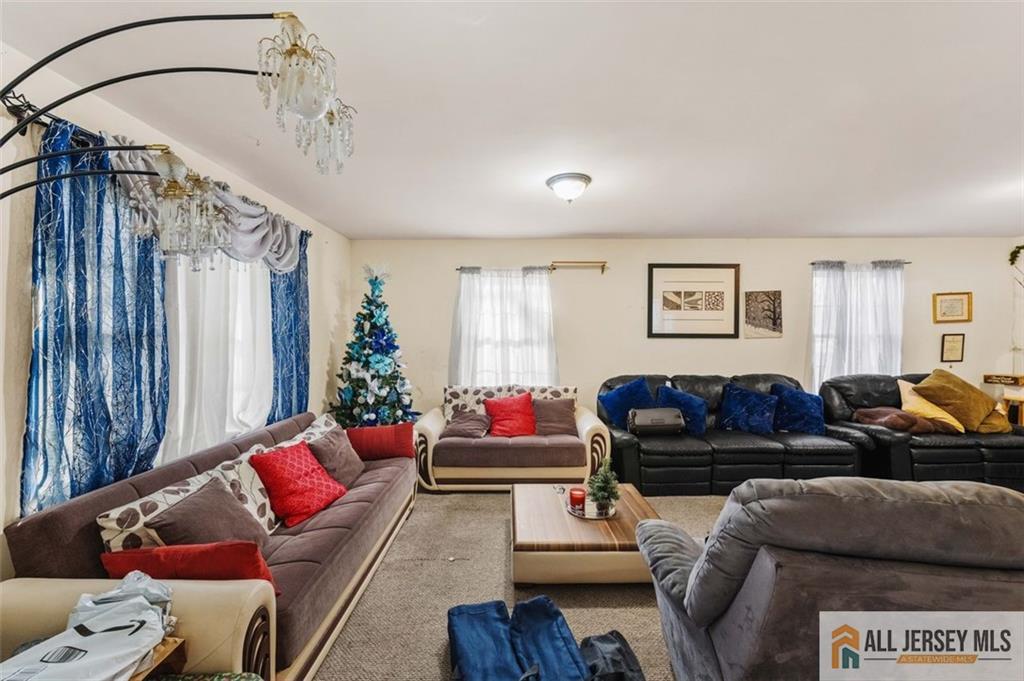 643 Drake Avenue Middlesex, NJ 08846 - Photo 4 of 28 a living room with furniture and a couch