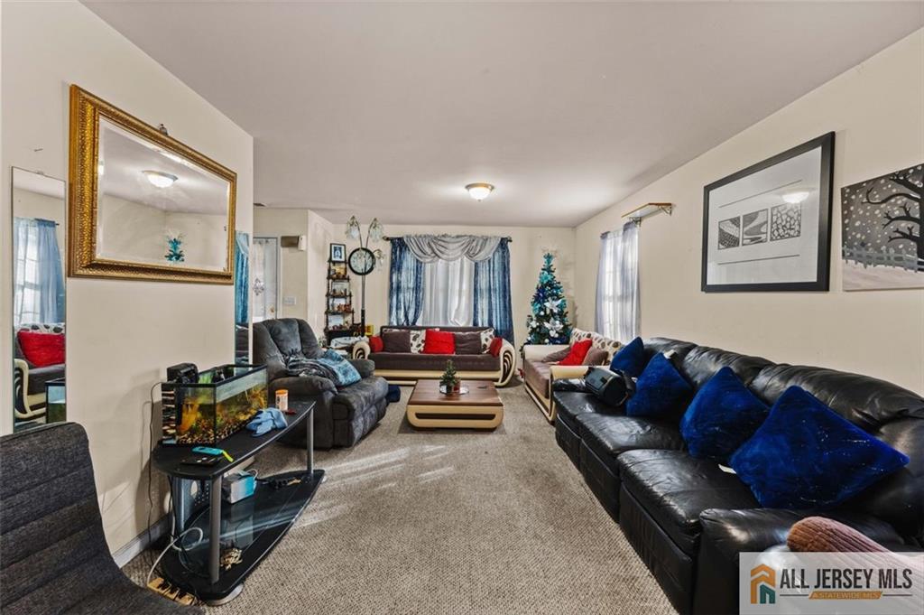 643 Drake Avenue Middlesex, NJ 08846 - Photo 5 of 28 a living room with furniture and a mirror
