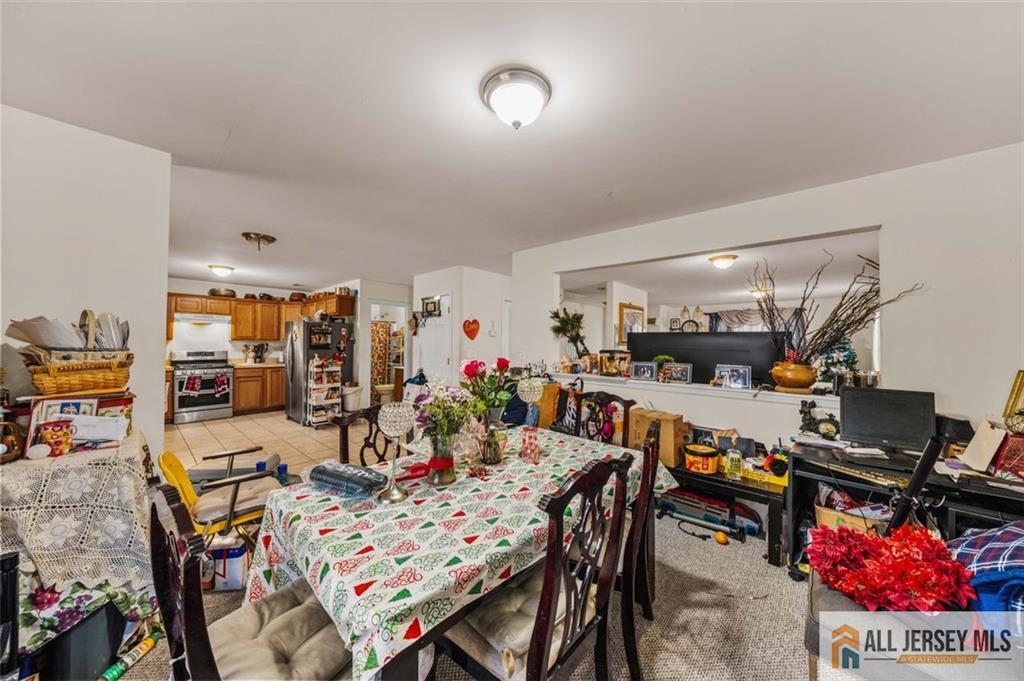 643 Drake Avenue Middlesex, NJ 08846 - Photo 6 of 28 a view of a dining room with furniture