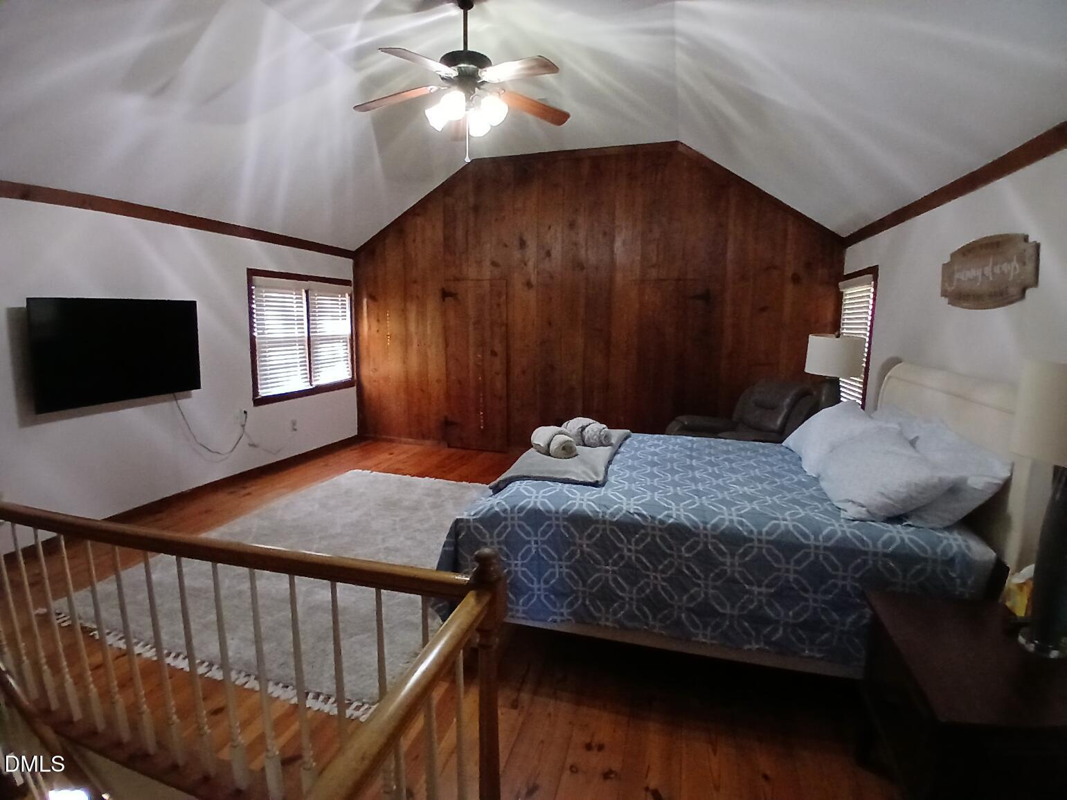 1920 Kelly Road Apex, NC 27502 - Photo 41 of 44 a bedroom with a bed and a tv