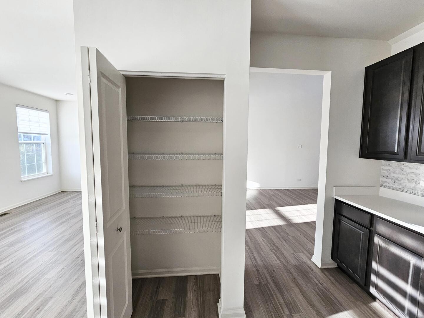 2049 Stuttle Road Batavia, IL 60510 - Photo 8 of 14 a bathroom with a sink and a large mirror