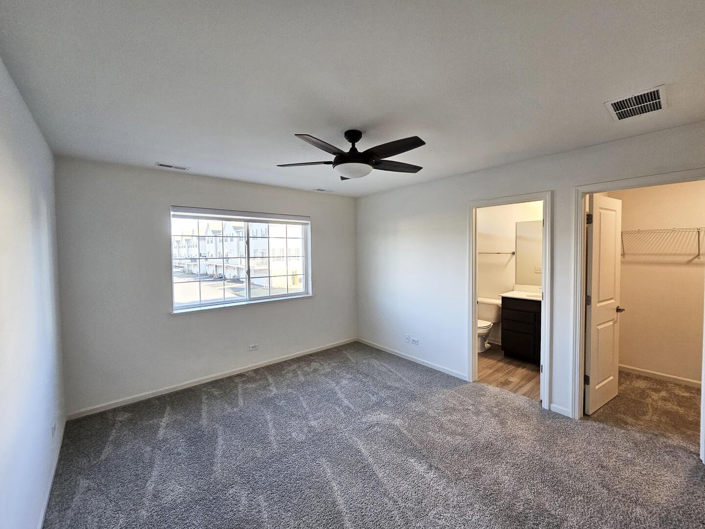 2049 Stuttle Road Batavia, IL 60510 - Photo 9 of 14 an empty room that has a window in it