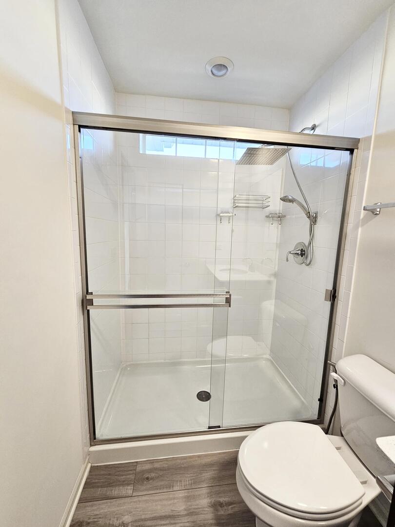 2049 Stuttle Road Batavia, IL 60510 - Photo 10 of 14 a bathroom with a glass shower door