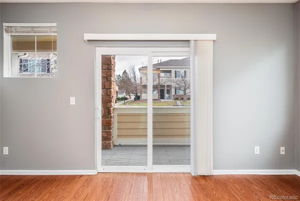 a view of a bedroom with wooden floor and bedroom