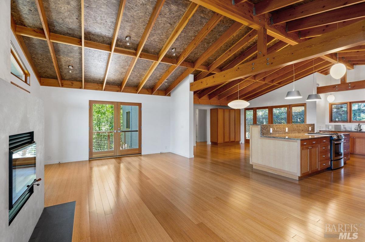 216 Reed Street Mill Valley, CA 94941 - Photo 4 of 17 a view of a room with wooden floors and kitchen