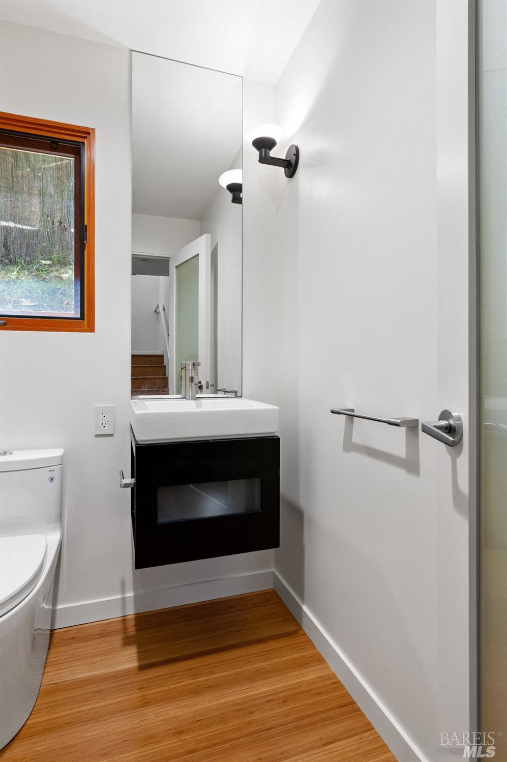 216 Reed Street Mill Valley, CA 94941 - Photo 10 of 17 a bathroom with a sink and a mirror