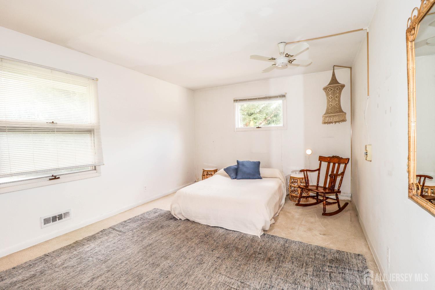 12 Buchanan Road Metuchen, NJ 08840 - Photo 21 of 42 a bedroom with a bed furniture and a window