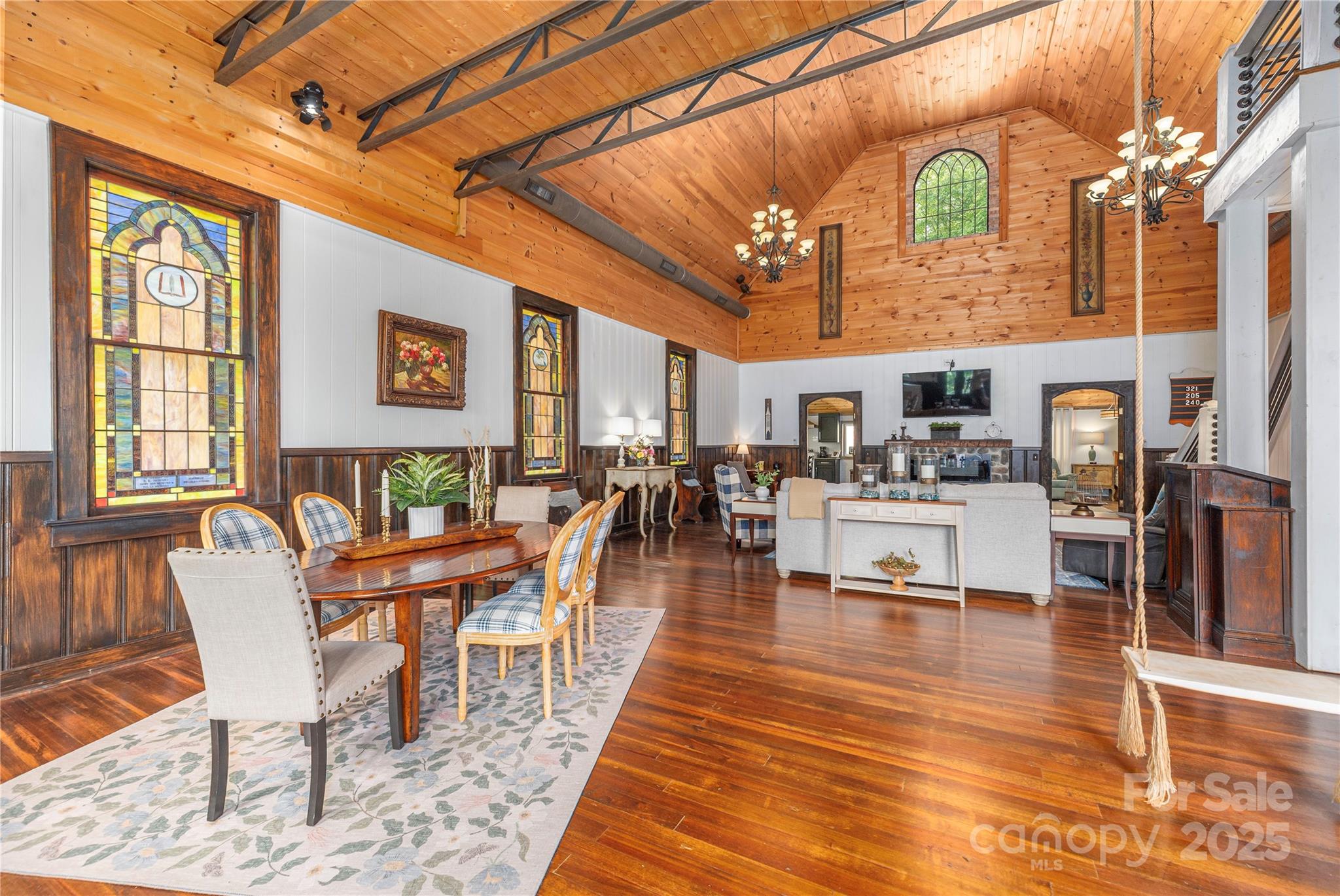 1202 Iron Duff Road Waynesville, NC 28785 - Photo 8 of 42 a living room with lots of furniture and kitchen view