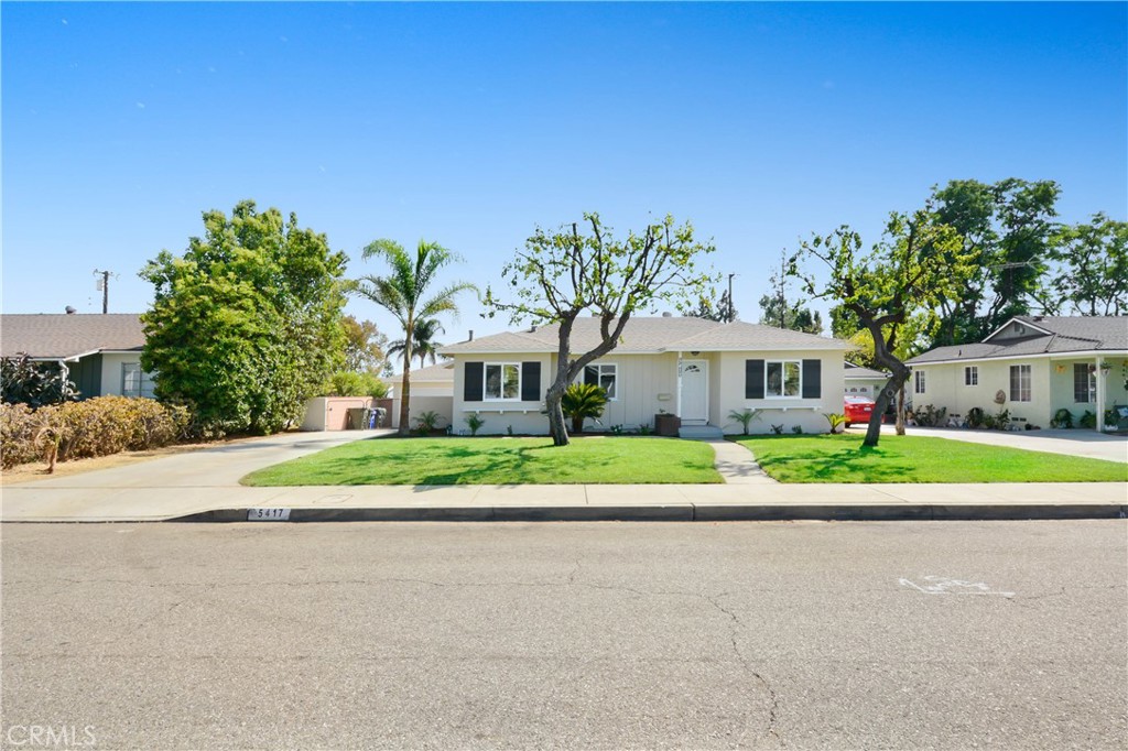 a house with a garden in front of it