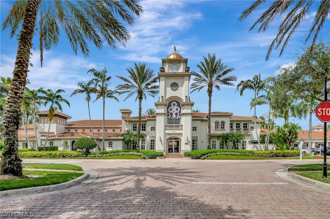 5682 Eleuthera Way Naples, FL 34119 - Photo 27 of 47 a front view of multiple houses with yard