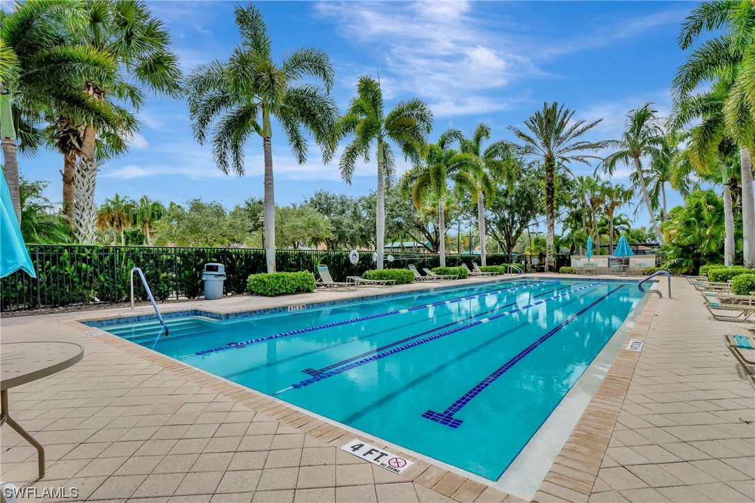 5682 Eleuthera Way Naples, FL 34119 - Photo 28 of 47 a view of swimming pool with a yard