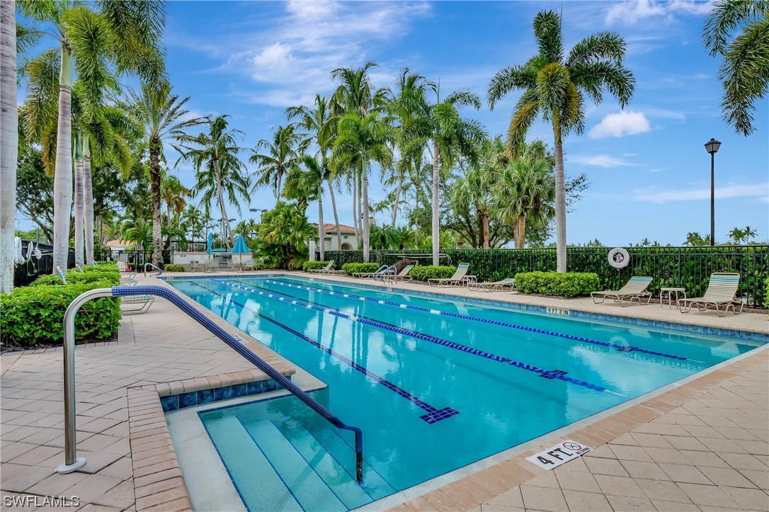 5682 Eleuthera Way Naples, FL 34119 - Photo 29 of 47 a view of swimming pool from a balcony