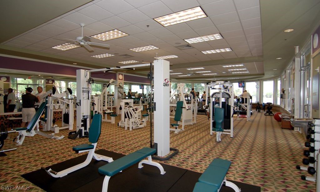 5682 Eleuthera Way Naples, FL 34119 - Photo 33 of 47 a view of a room with gym equipment