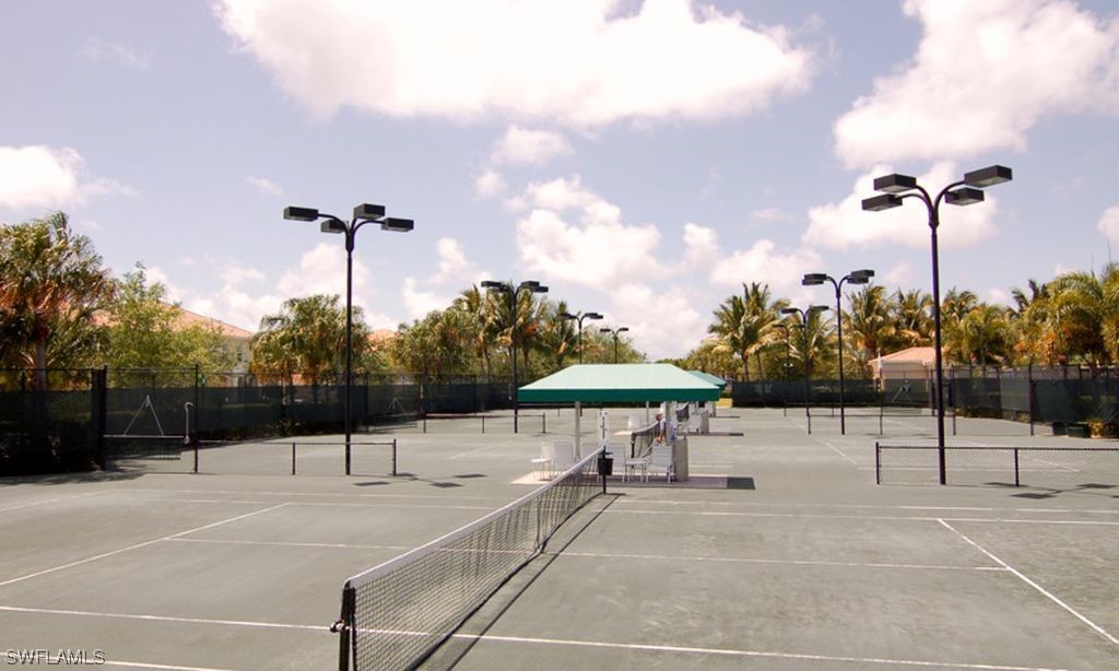 5682 Eleuthera Way Naples, FL 34119 - Photo 39 of 47 a outdoor space with lots of tables and chairs