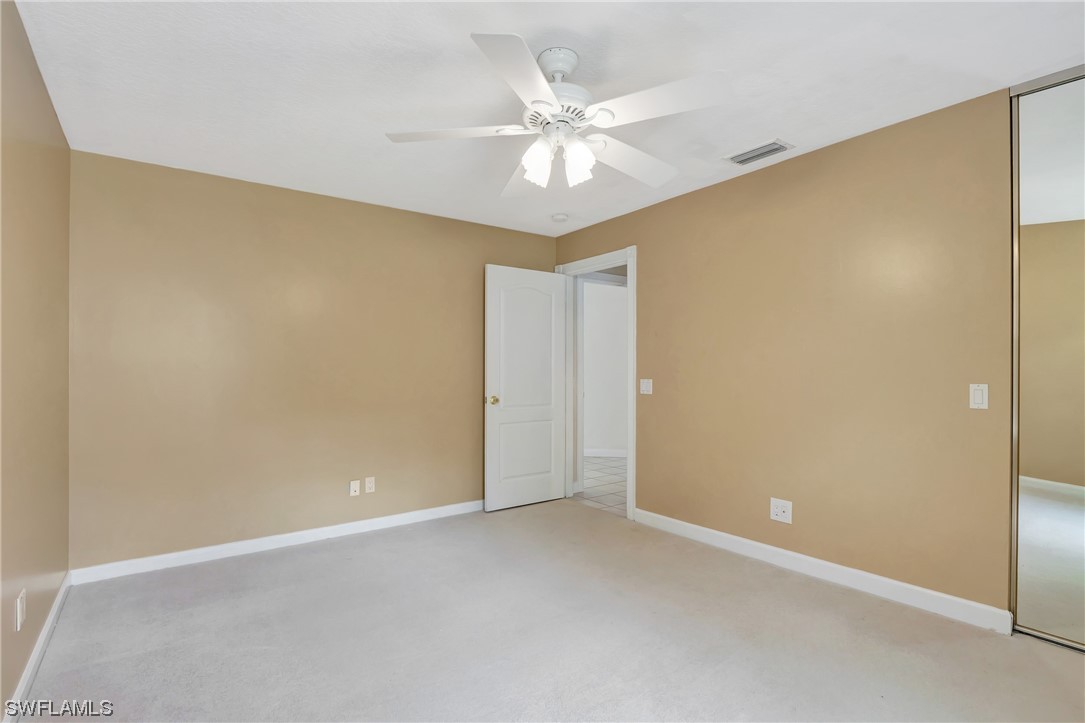 5682 Eleuthera Way Naples, FL 34119 - Photo 7 of 47 a view of an empty room