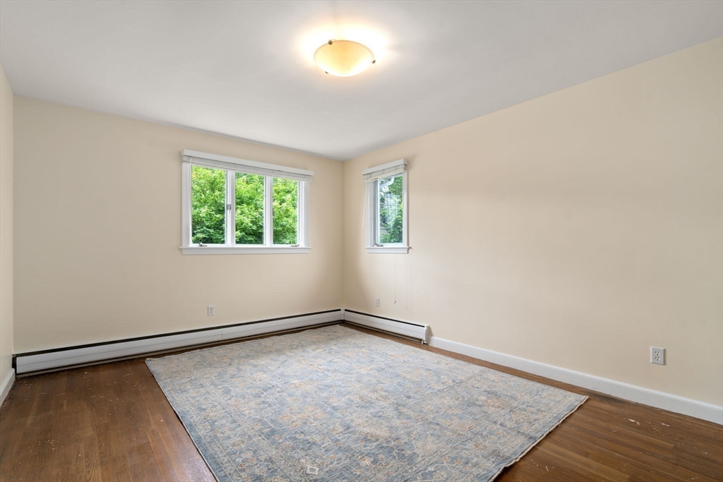 61 Sevland Road Newton, MA 02459 - Photo 14 of 27 an empty room with windows