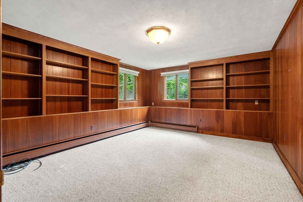 61 Sevland Road Newton, MA 02459 - Photo 17 of 27 a view of an empty room with furniture and window
