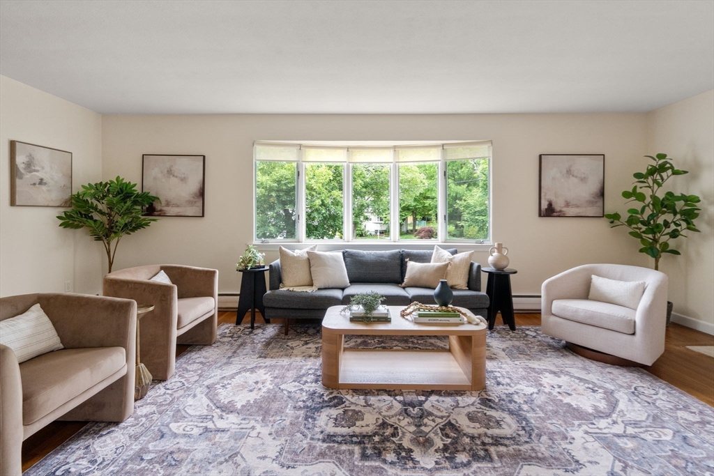 61 Sevland Road Newton, MA 02459 - Photo 2 of 27 a living room with furniture and a large window