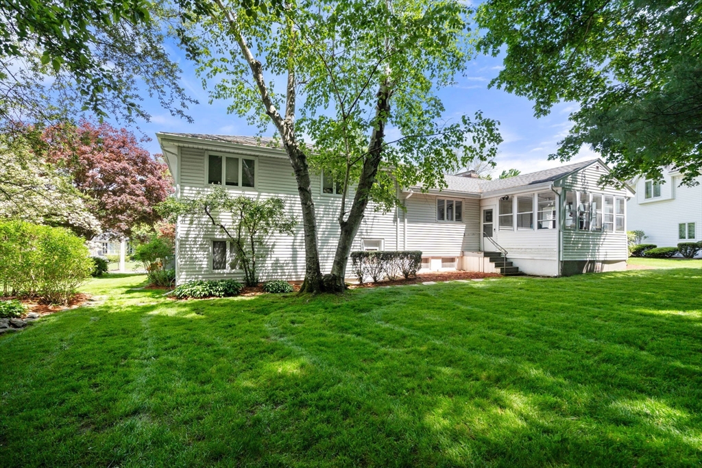 61 Sevland Road Newton, MA 02459 - Photo 21 of 27 a view of a house with a backyard