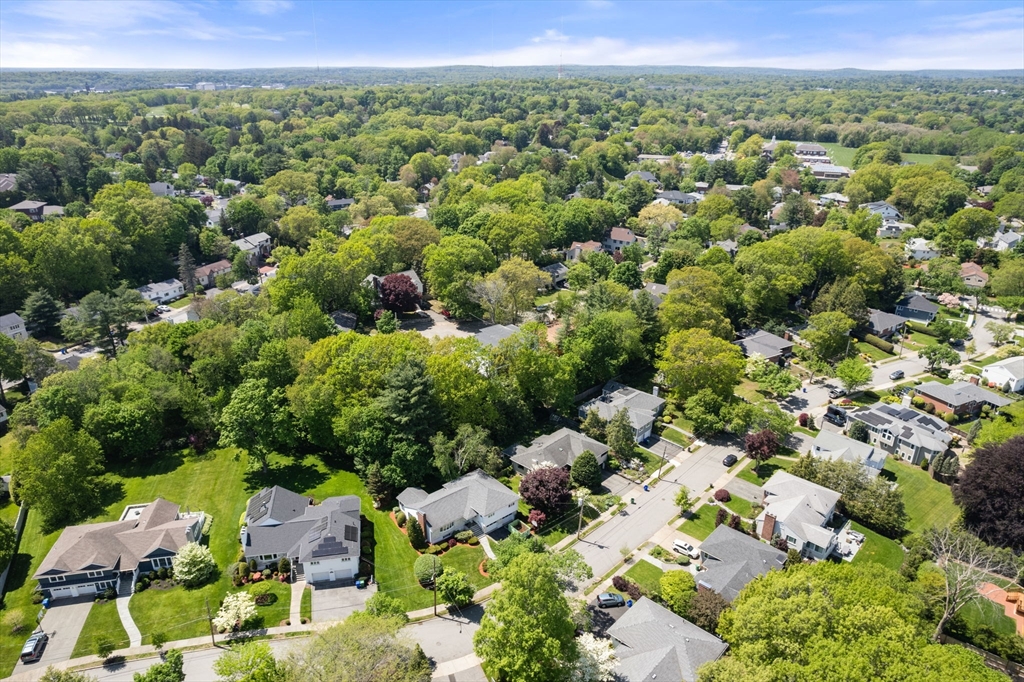 61 Sevland Road Newton, MA 02459 - Photo 26 of 27 a view of a city with lush green forest