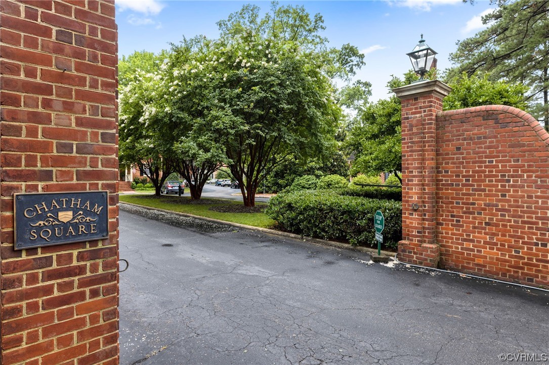 6161 River Road, Unit 1 Richmond, VA 23226 - Photo 2 of 32 front view of a building with a garden