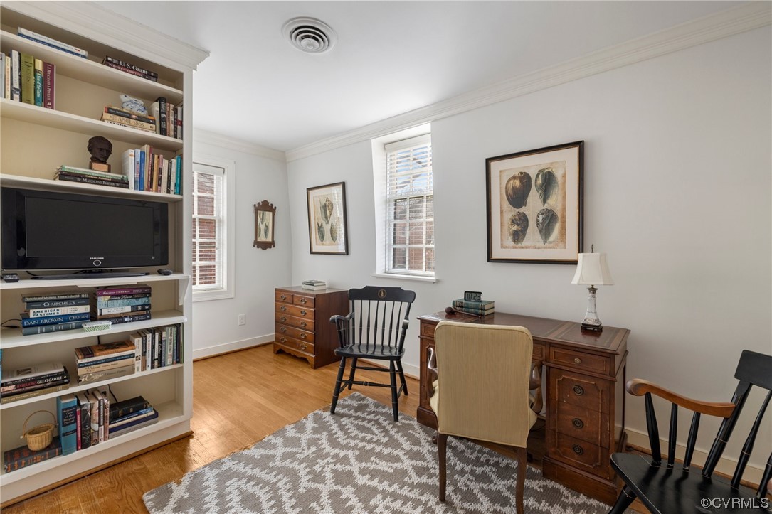 6161 River Road, Unit 1 Richmond, VA 23226 - Photo 26 of 32 a workspace with furniture bookshelf and a window