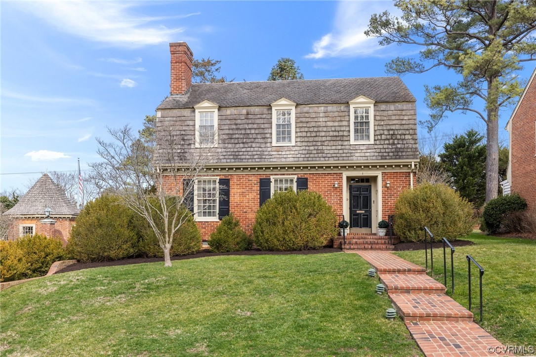 6161 River Road, Unit 1 Richmond, VA 23226 - Photo 30 of 32 a front view of a house with a garden