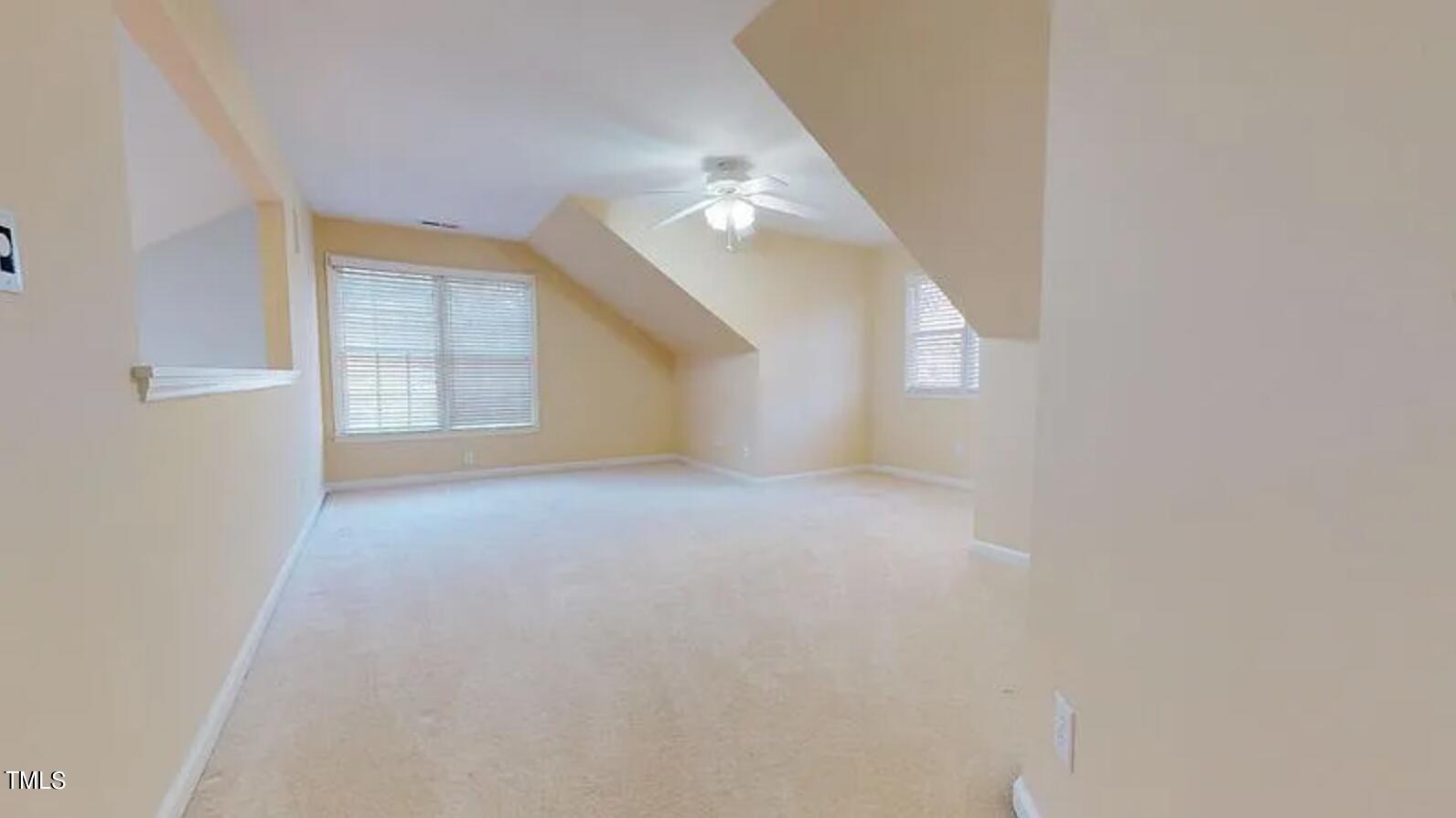 2604 Crofton Springs Drive Raleigh, NC 27615 - Photo 17 of 21 an empty room with windows and closet