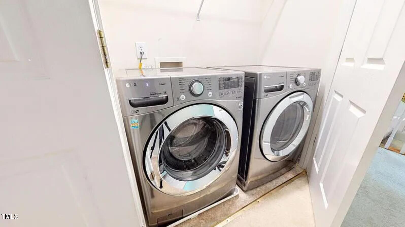 2604 Crofton Springs Drive Raleigh, NC 27615 - Photo 18 of 21 a utility room with dryer and washer