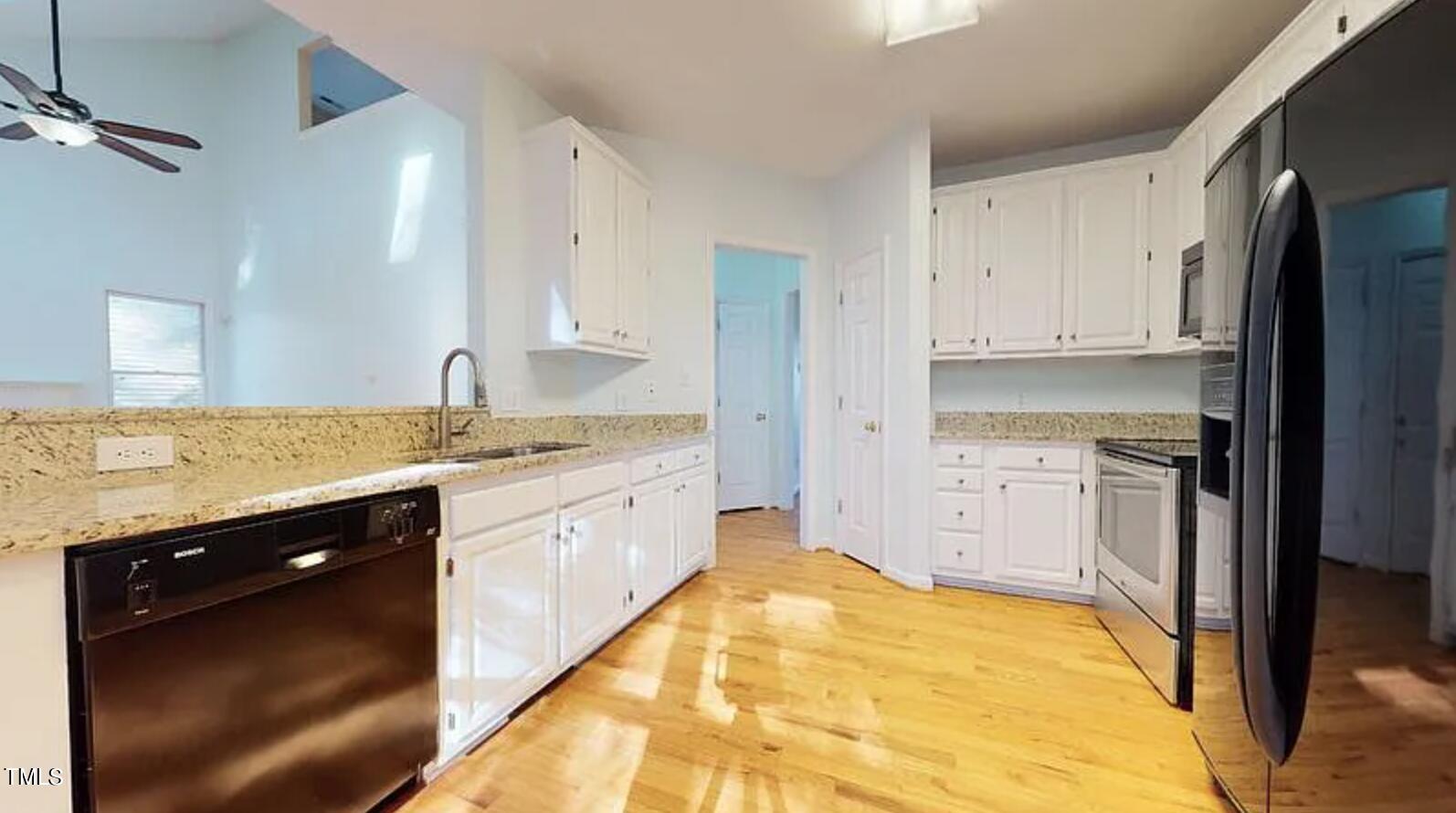 2604 Crofton Springs Drive Raleigh, NC 27615 - Photo 7 of 21 008Crofton Kitchen1