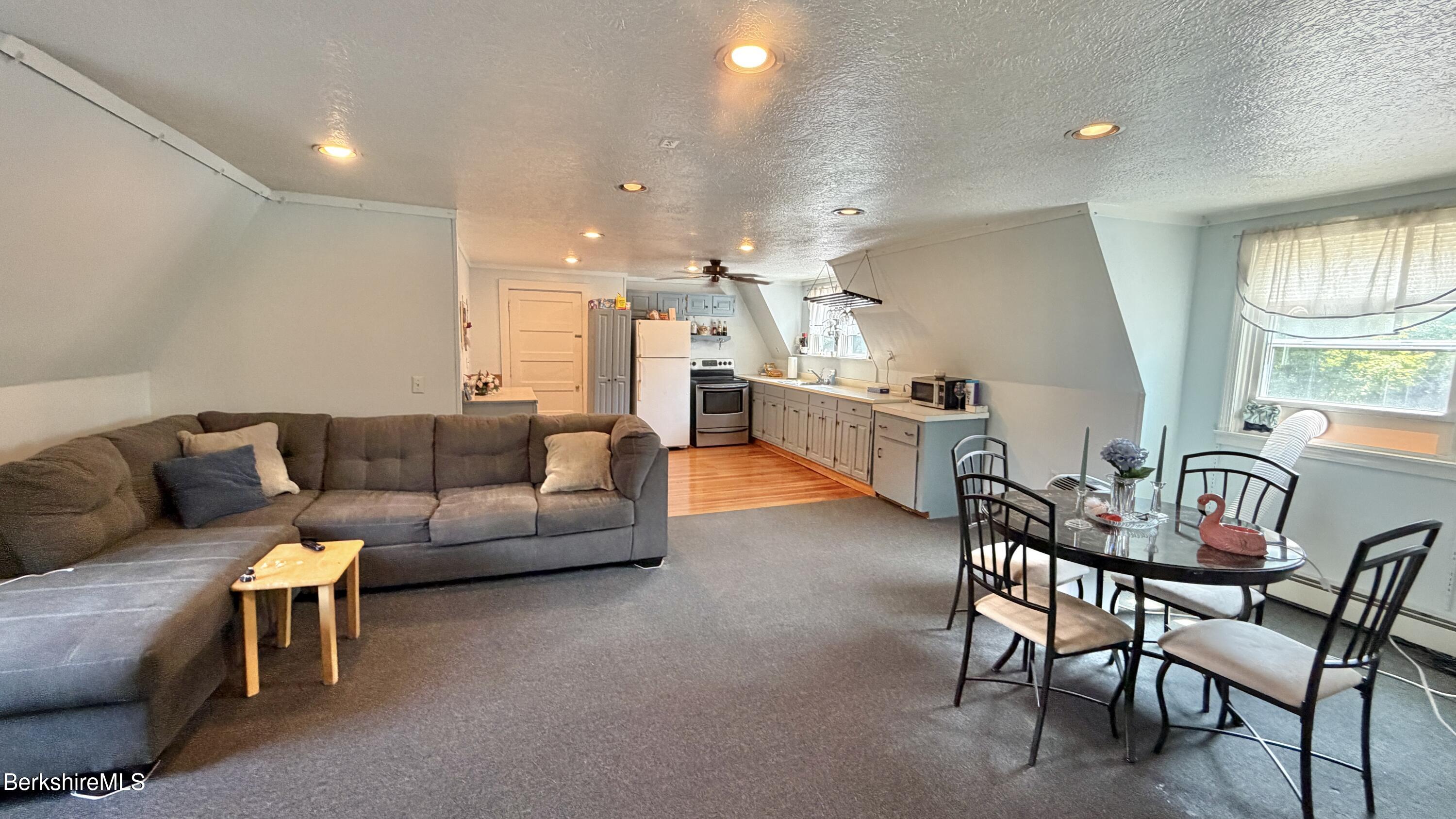 928 Main Road Stamford, VT 05352 - Photo 40 of 49 2nd flr living, dining kitchen