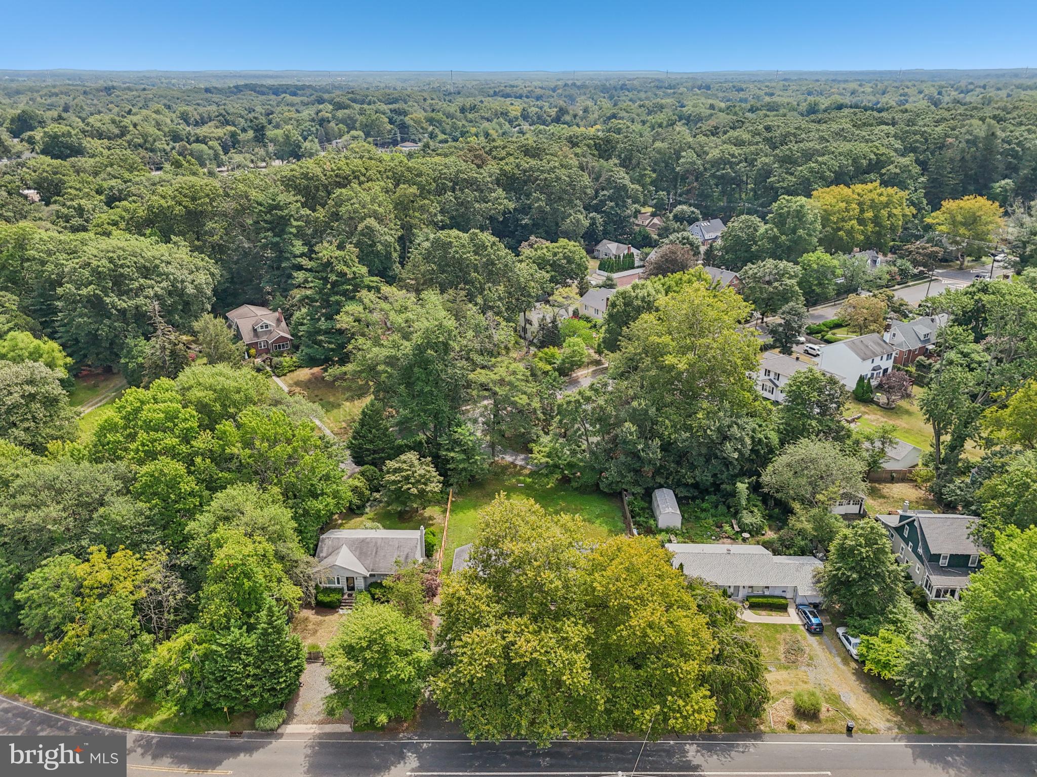 35 Wallace Road Princeton Junction, NJ 08550 - Photo 28 of 34 an aerial view of a houses with a yard and lake view