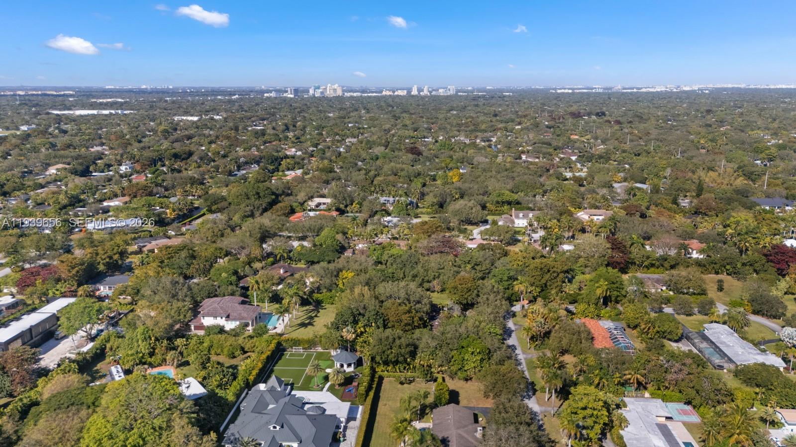 13500 Southwest 68th Court Pinecrest, FL 33156 - Photo 14 of 21 an aerial view of a city
