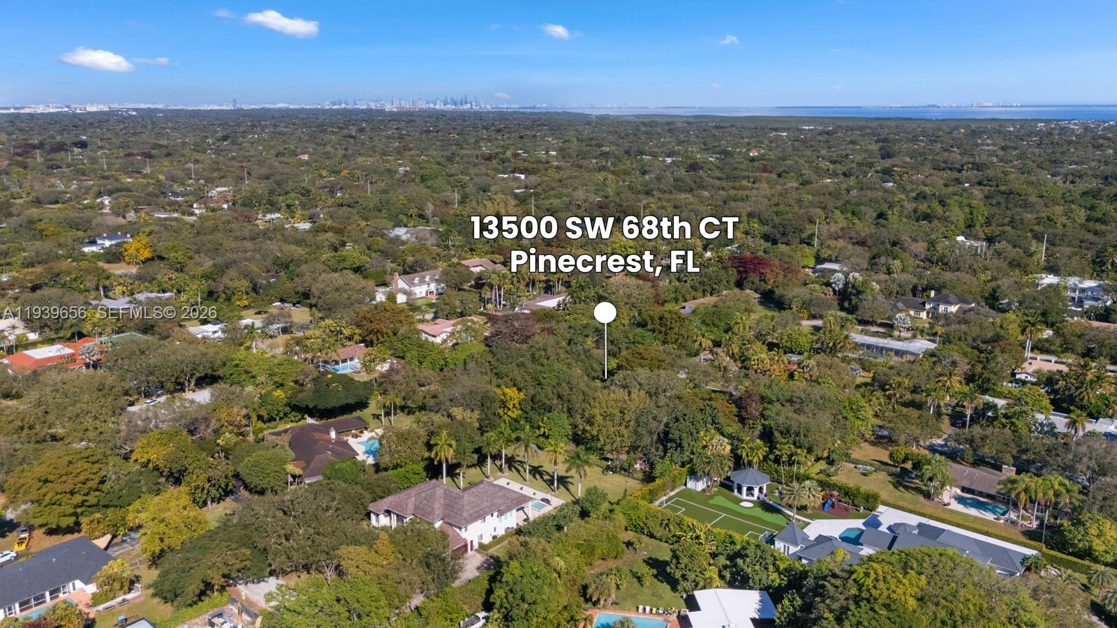 13500 Southwest 68th Court Pinecrest, FL 33156 - Photo 2 of 21 a view of city and green space