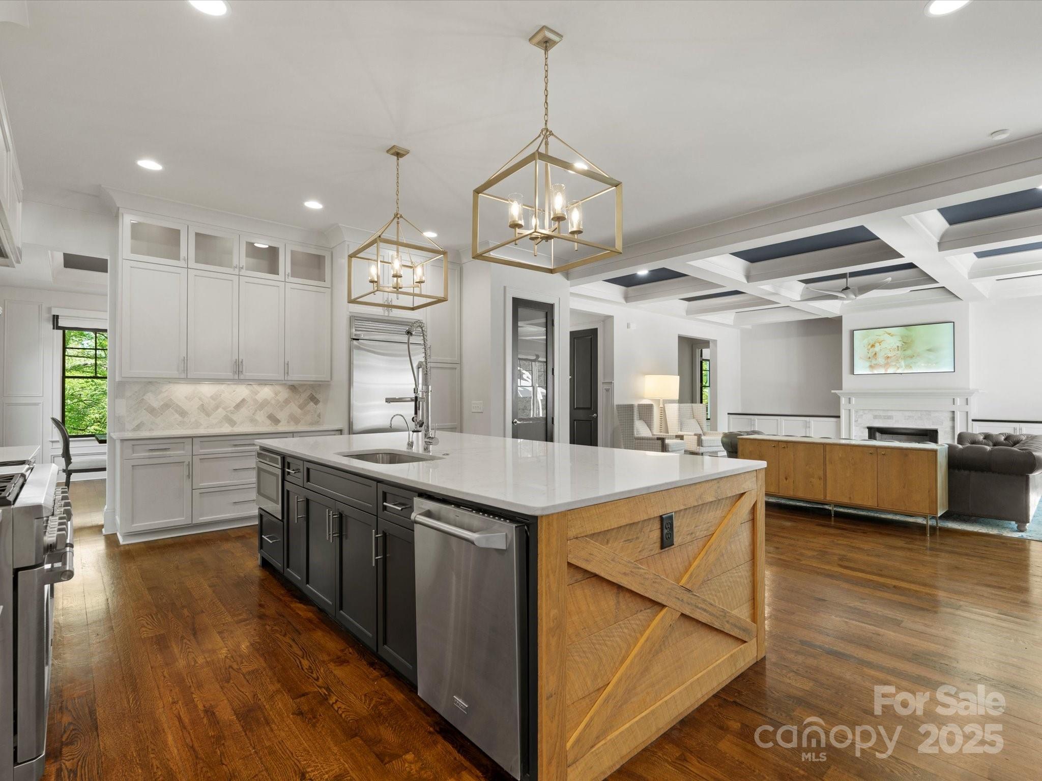 6700 Folger Drive Charlotte, NC 28270 - Photo 13 of 48 a kitchen with counter top space cabinets and stainless steel appliances