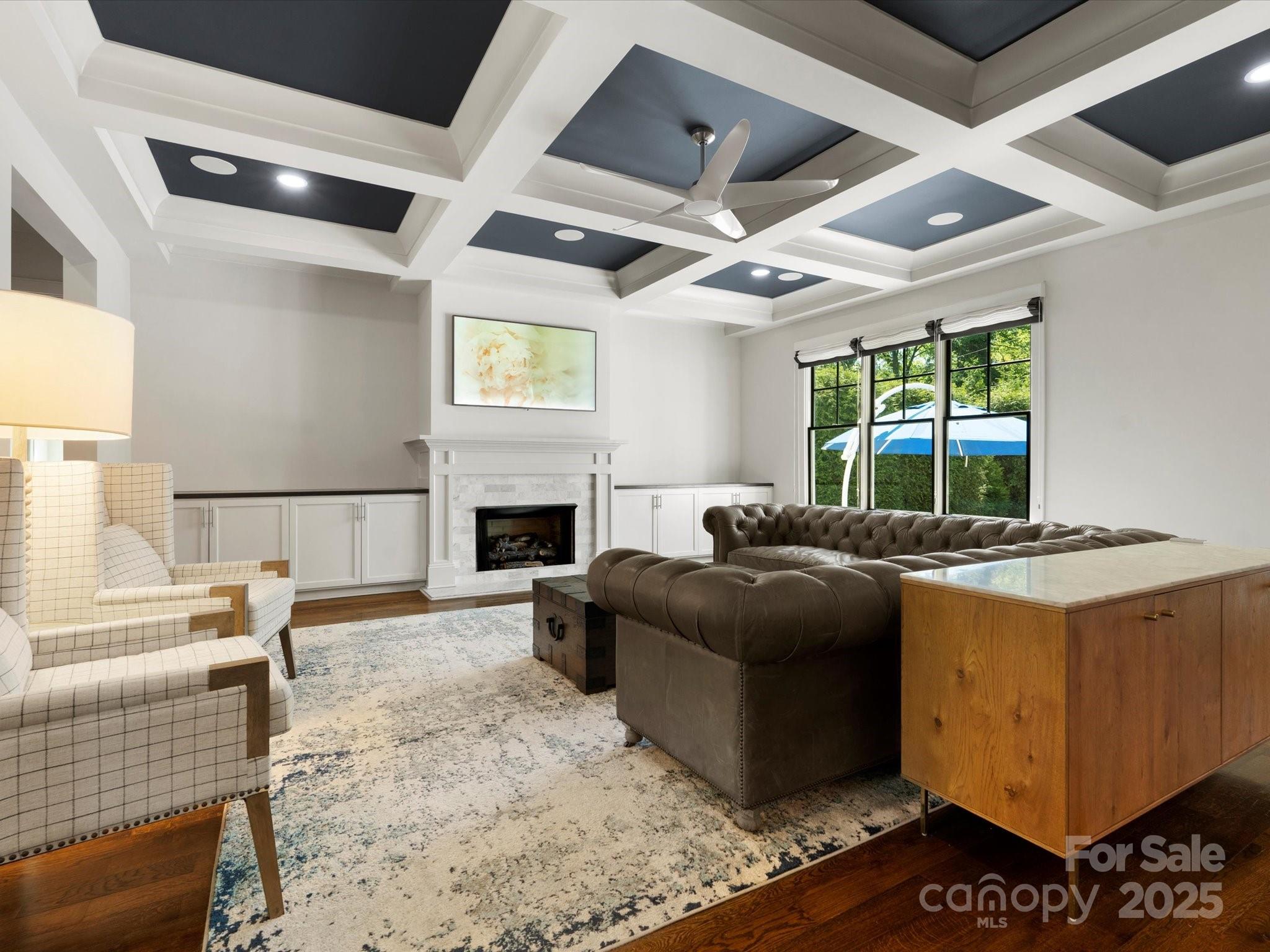 6700 Folger Drive Charlotte, NC 28270 - Photo 14 of 48 a kitchen with furniture and a fireplace