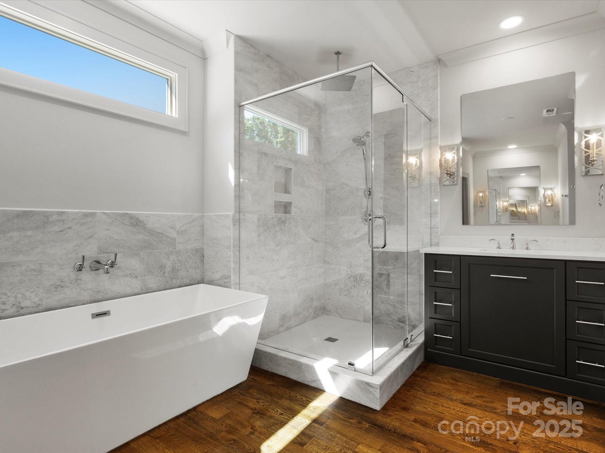 6700 Folger Drive Charlotte, NC 28270 - Photo 24 of 48 a bathroom with a bathtub shower sink mirror and toilet