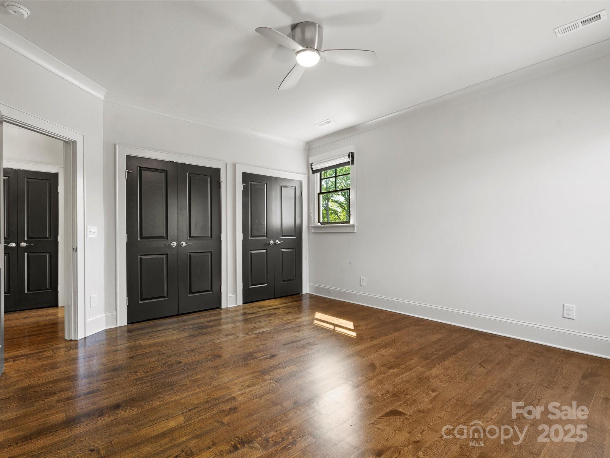6700 Folger Drive Charlotte, NC 28270 - Photo 27 of 48 wooden floor in an empty room with a window
